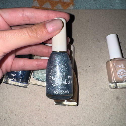 Nail polishes new, pack of 5 with blue, gold and nude shades