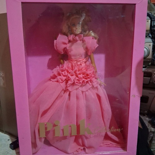 Barbie doll collectible like new with stand