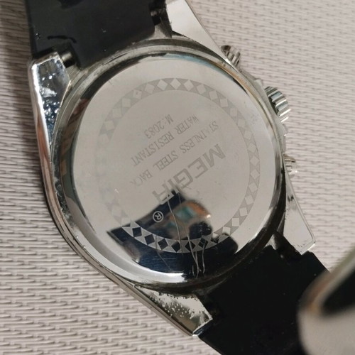 Megir watch used with scratch, battery replacement needed