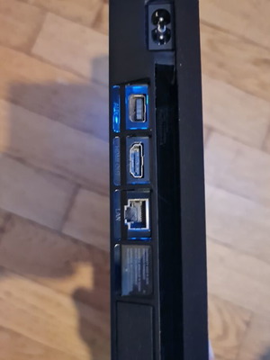 PlayStation 4 Slim 500GB console with controller, HDMI and power cable