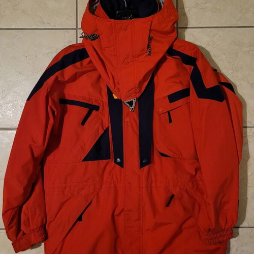 Ski and mountaineering jacket like new, red with blue details, medium