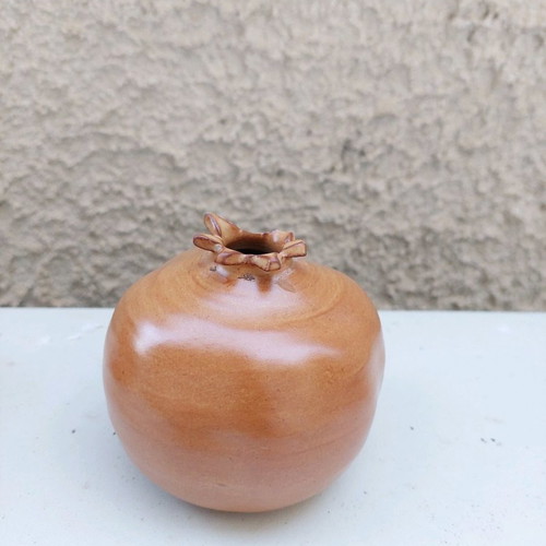 Clay pomegranate used, brown decorative