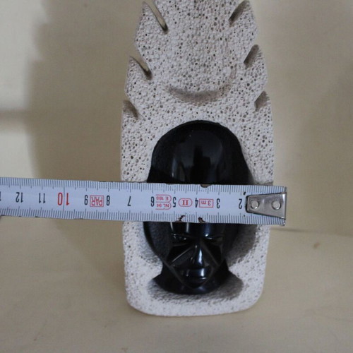 Obsidian African face sculpture