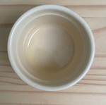 Small beige ceramic bowl used