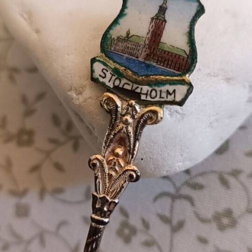 Vintage souvenir spoon from Stockholm with enamel decoration