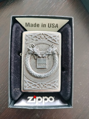 Zippo lighter like new with embossed dragon head design