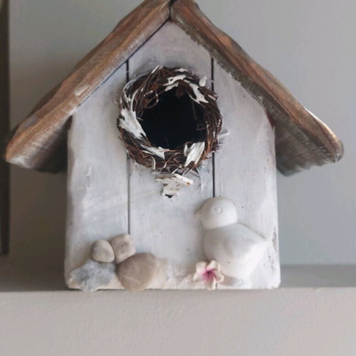 Wooden tabletop house used with ring for hanging