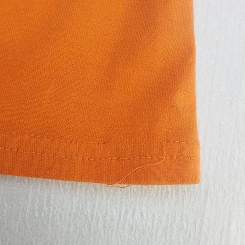 Vintage women's t-shirt with leopard sleeves, like new, orange