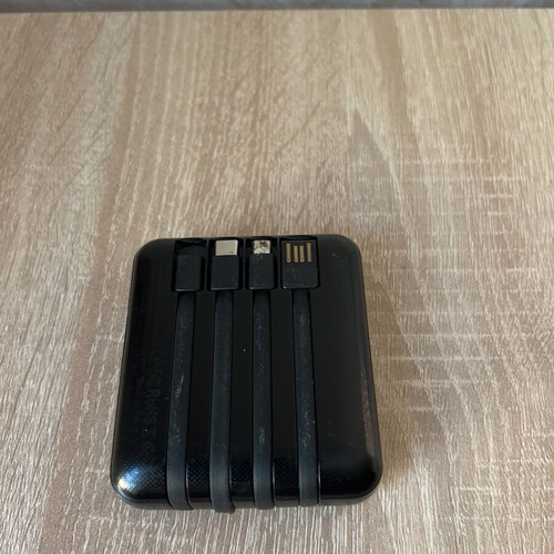 Power bank used with 3 cables and flashlight with two lamps