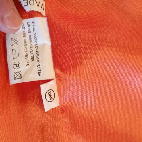 Sleeveless women's jacket like new, size large, orange