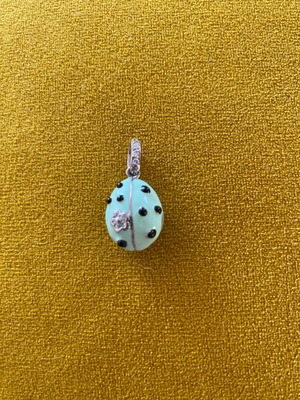 Modern pendant with silver detail and rhinestones