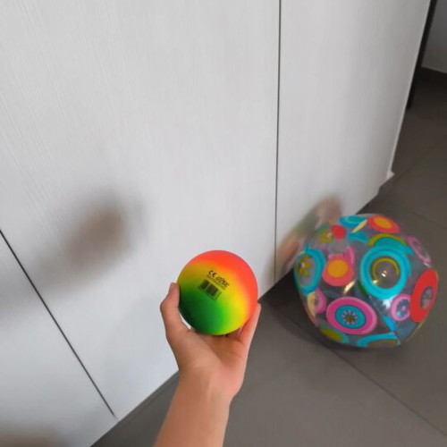 Inflatable beach ball and small plastic ball