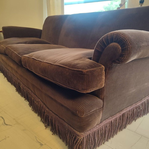 Handmade sofa used with brown velvet upholstery and walnut legs