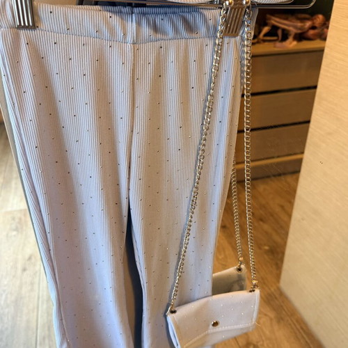 Turquoise set with pants, top and rhinestone bag
