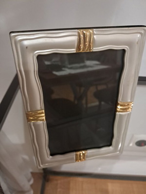 Silver photo frame used, 18x12 cm with gold design and velvet back