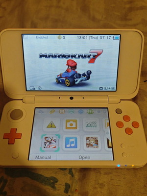 Nintendo 2DS XL with Mario Kart 7, charger and stylus