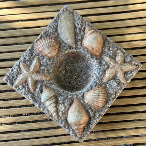 Ceramic tealight holder with sea theme
