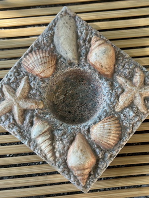 Ceramic tealight holder with sea theme