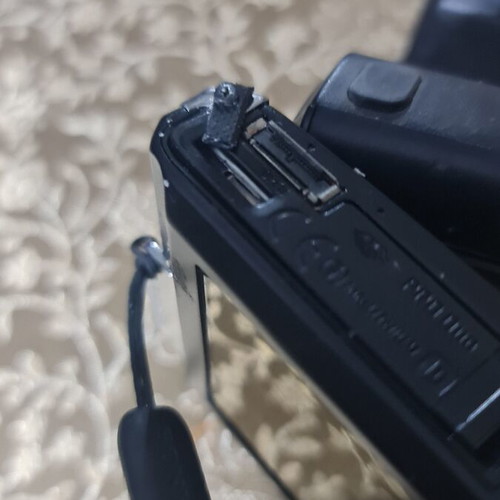 Sony Cyber-shot TSC-T70 camera with battery and accessories
