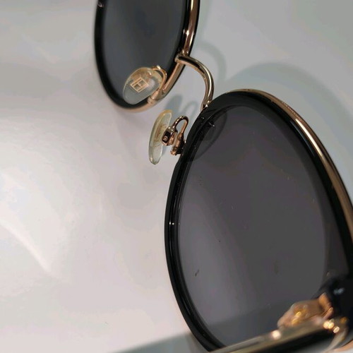 Tommy Hilfiger sunglasses like new, black and gold