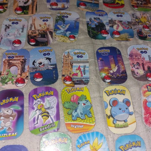 Pokémon metal tags like new, pack of 116 plus 5 large