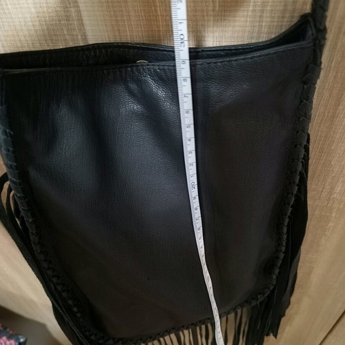 Women's leather crossbody bag with fringes nearly unused black