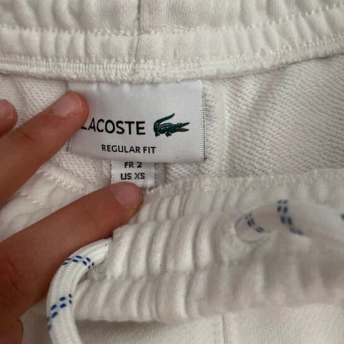Lacoste joggers white with blue stripe