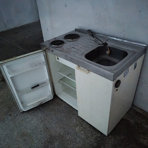 Fridge, kitchen unit and sink used, needs external paint