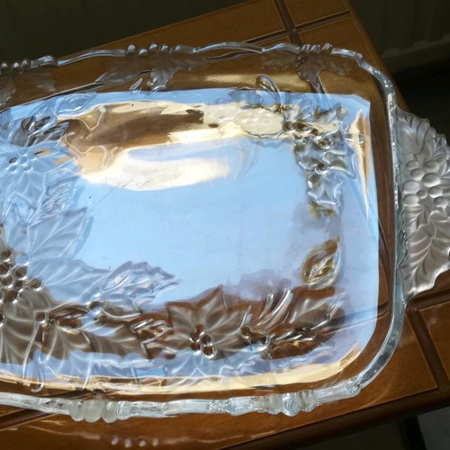 Serving tray used with embossed glass designs