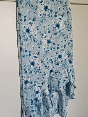 Pink Woman floral skirt with asymmetric ruffle hem