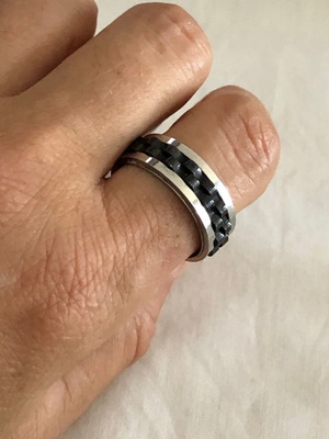 Men's steel ring used with movable middle part