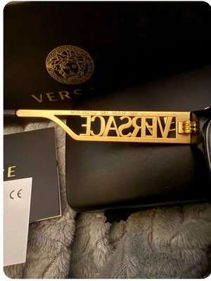Versace glasses like new, black and gold frame
