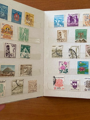 Album with old Egyptian stamps used, 100 pieces