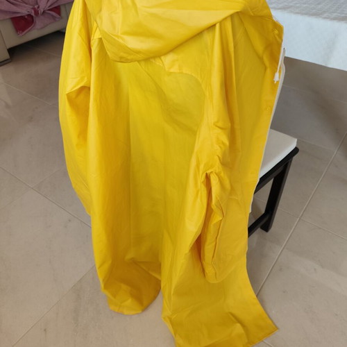 Yellow Nitscerada Large like new, raincoat size with hood