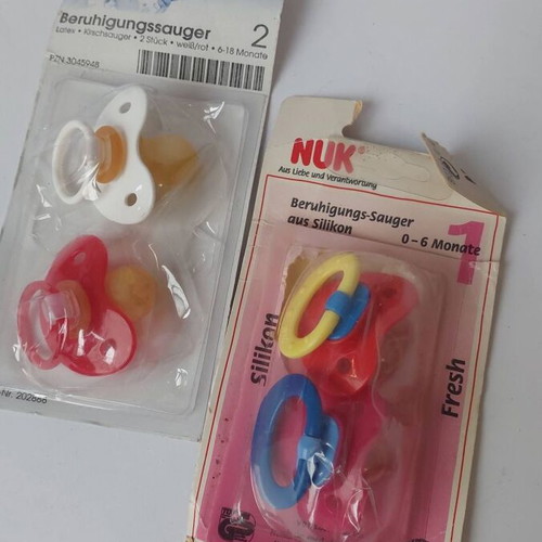 Set of new baby pacifiers and soothers