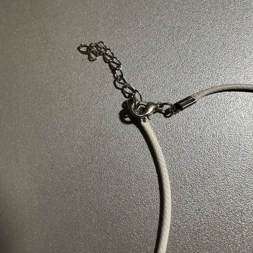 Handmade necklace with white cord and purple star like new