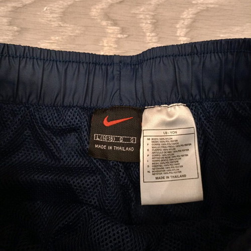 Vintage Nike track pants navy with yellow stripes like new