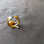 Adjustable ring with eye, gold color, like new