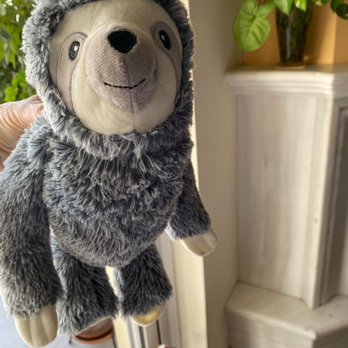 Plush animal like new, soft texture, 32 cm length