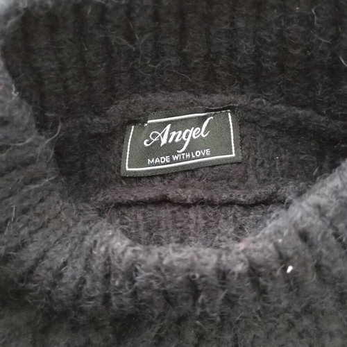 Knitted women's sweater black like new, one size
