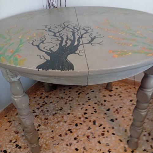 Round table with painted design, chalk paint