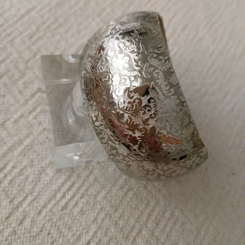 Vintage cuff bracelets like new, embossed geometric and floral design, set of 2