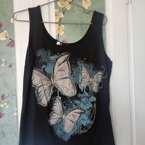 Derpouli Late Edition black top with butterflies like new