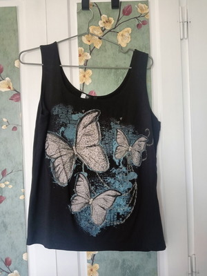Derpouli Late Edition black top with butterflies like new