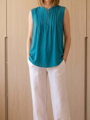 Attrattivo sleeveless blouse turquoise size S like new