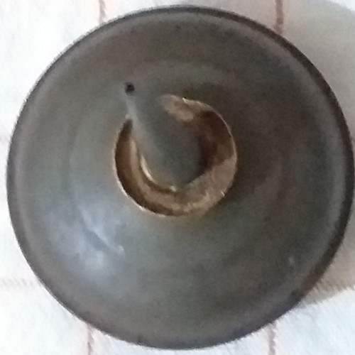 Set of 4 used oil collectors with iron, tin, and plastic