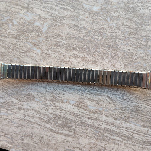 Swatch silver metallic elastic bracelet