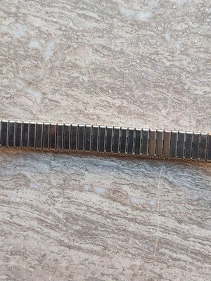 Swatch silver metallic elastic bracelet