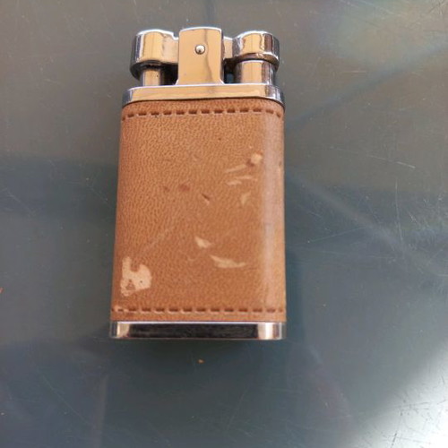 Drum collectible lighter used with leather wear