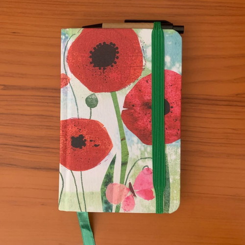 Floral notebook like new with pen, elastic band and bookmark